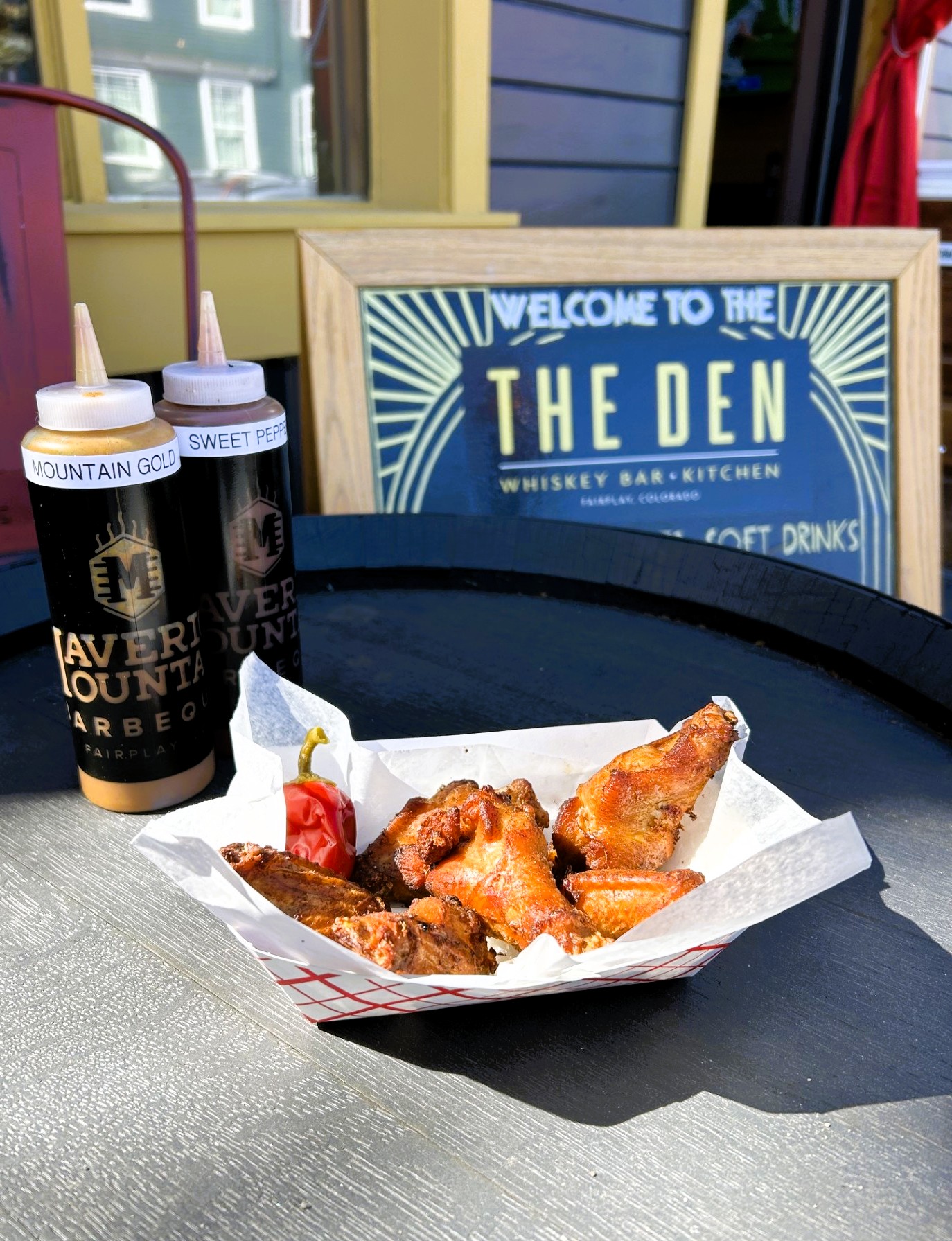 Smoked wings with Maverick Mountain Barbeque sauces on The Den patio